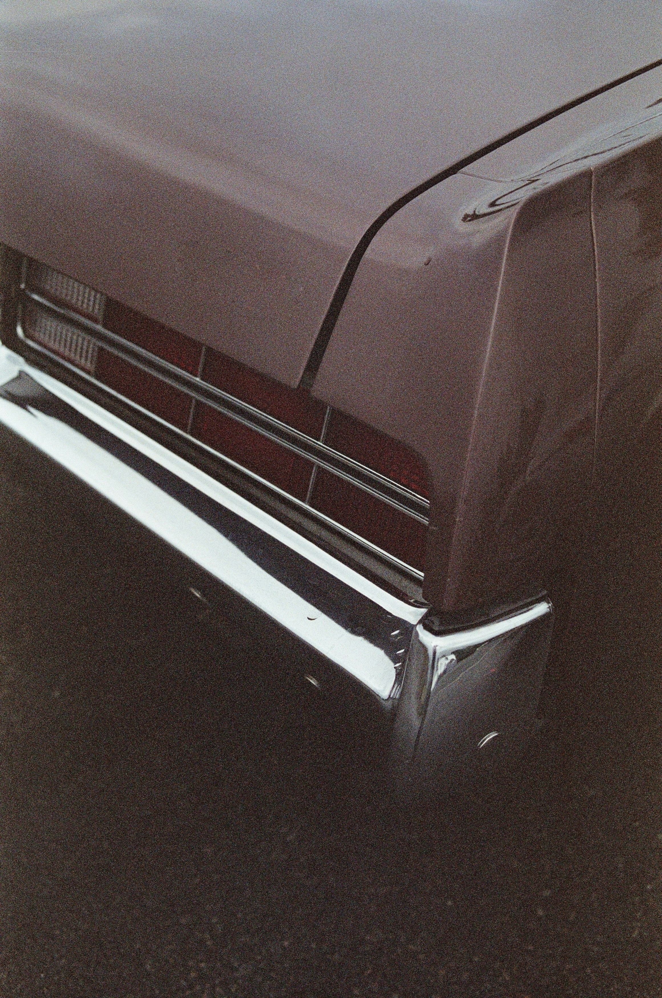 brown car with white license plate